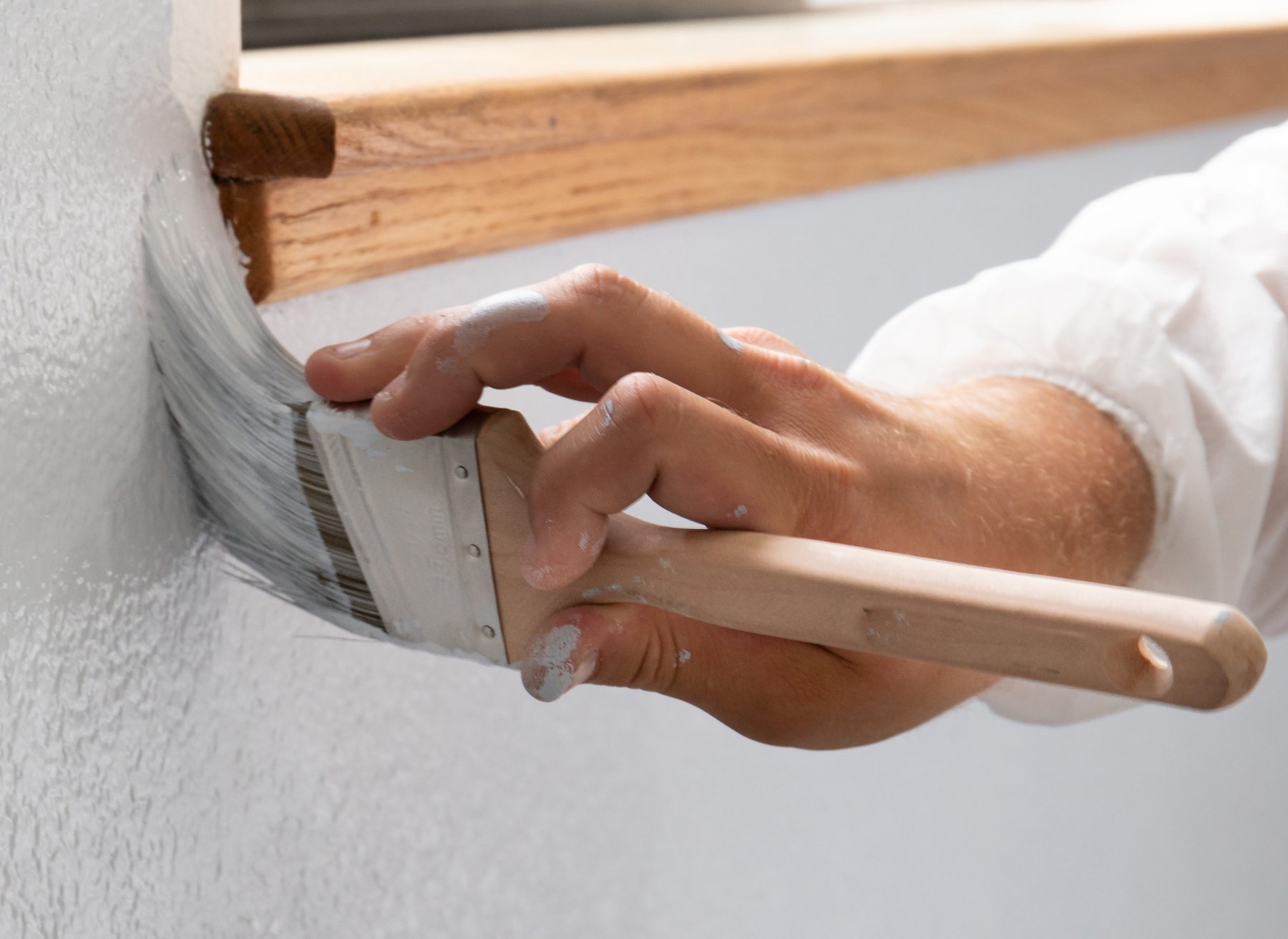 Painter cutting in with a brush