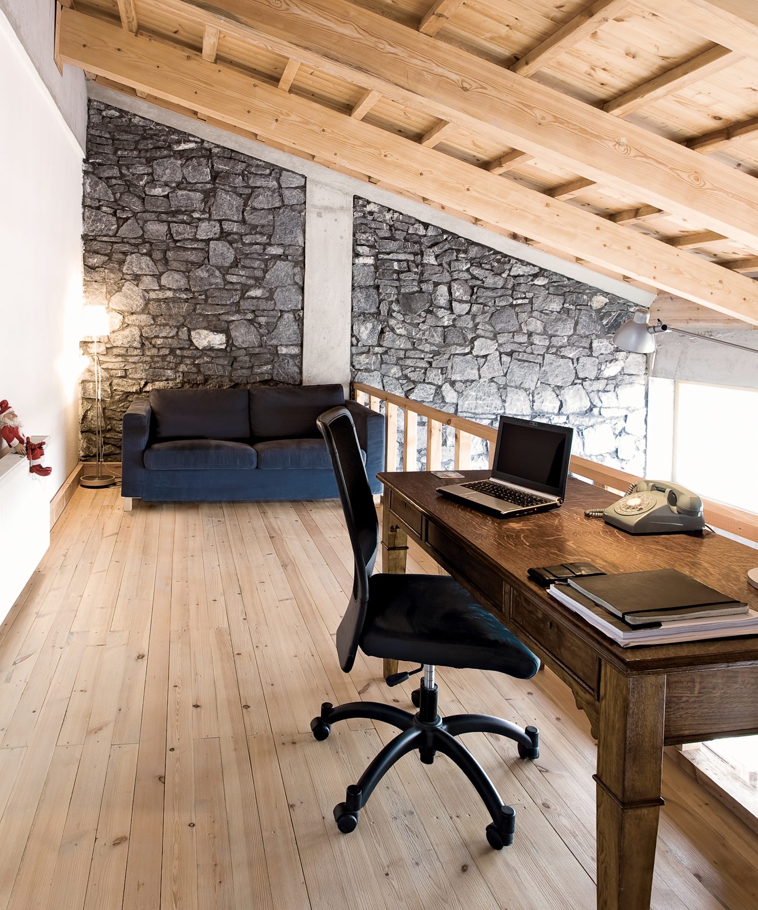 Stone wall and timber ceiling interior